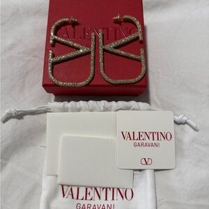 VLOGO SIGNATURE EARRINGS IN METAL AND SWAROVSKI® CRYSTALS.